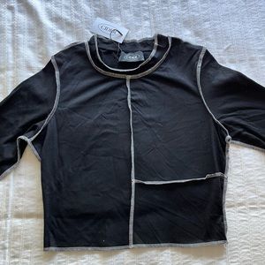 Black shirt with white top-stitch